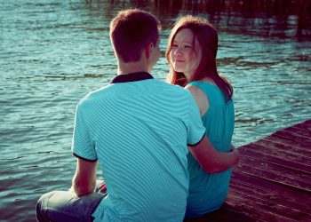 girl and boy, by the pond, by the water, embankment, together