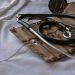 black stethoscope with brown leather case
