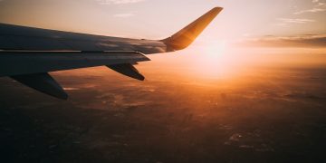 airplane on sky during golden hour