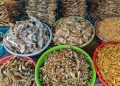 A bunch of bowls filled with different kinds of food