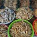 A bunch of bowls filled with different kinds of food